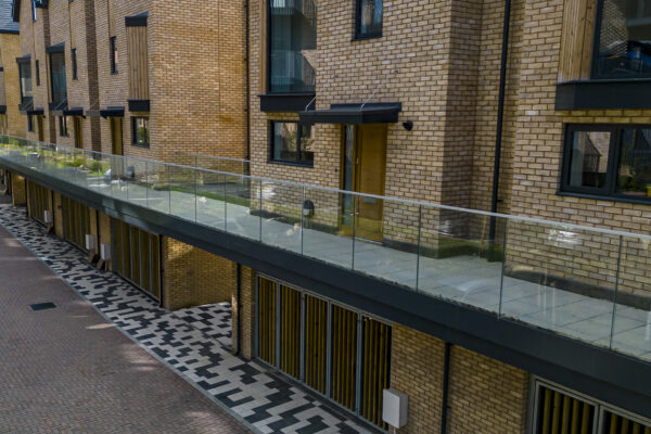 ISWUK Ltd | Facias, Cladding & Soffits | Entrance Canopies | Balconies | Balustrades | Stairs | Decking